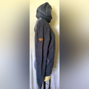 Superdry. Men’s medium but fits small. Blue grit color.